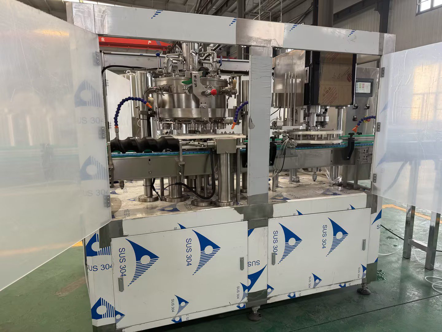 Can filling and seaming machine